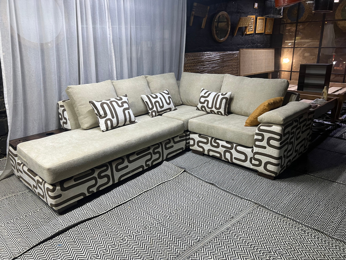Cream and casa L-shape sofa for ksh 160,000 with 50 D cushions