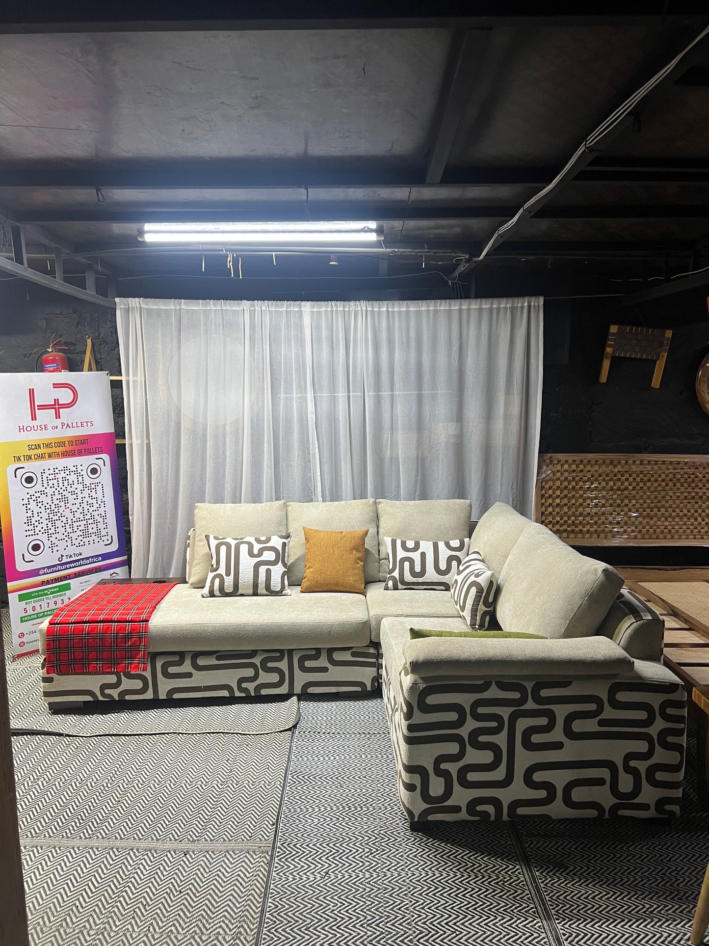 Cream and casa L-shape sofa for ksh 160,000 with 50 D cushions