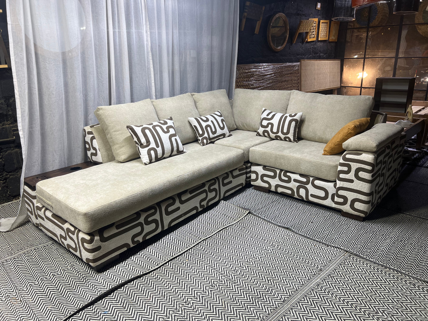 Cream and casa L-shape sofa for ksh 160,000 with 50 D cushions