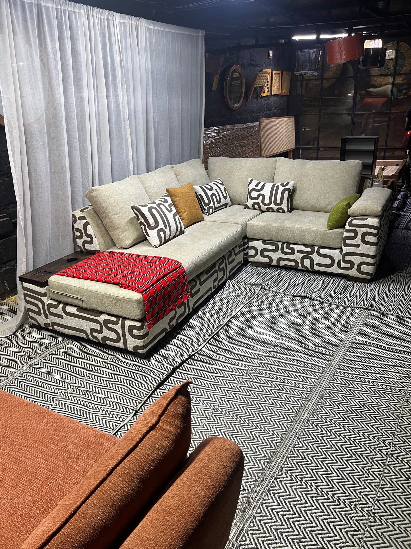 Cream and casa L-shape sofa for ksh 160,000 with 50 D cushions