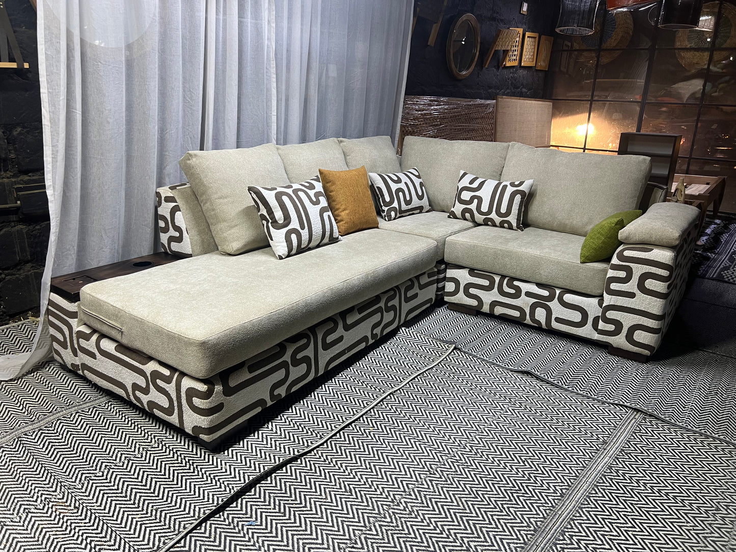 Cream and casa L-shape sofa for ksh 160,000 with 50 D cushions
