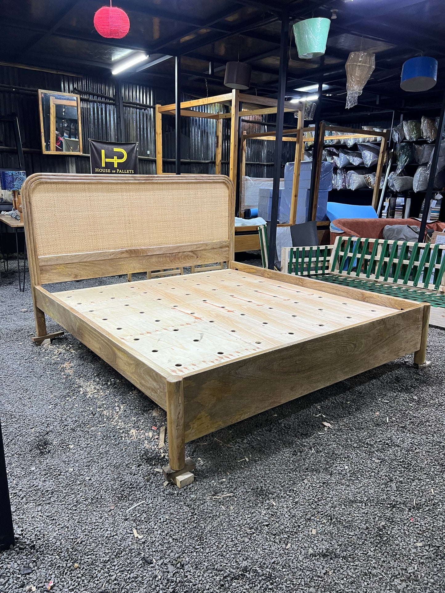 Mango wood rattan bed with curved headboard