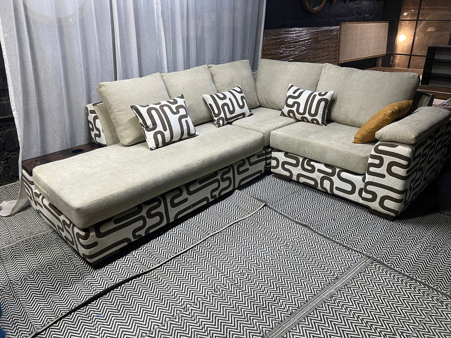 Cream and casa L-shape sofa for ksh 160,000 with 50 D cushions