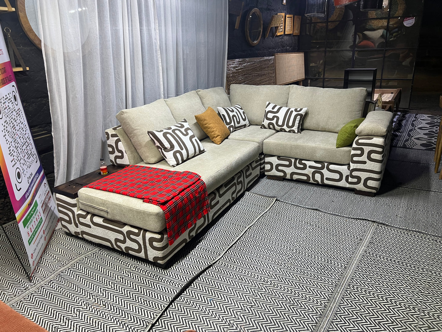 Cream and casa L-shape sofa for ksh 160,000 with 50 D cushions