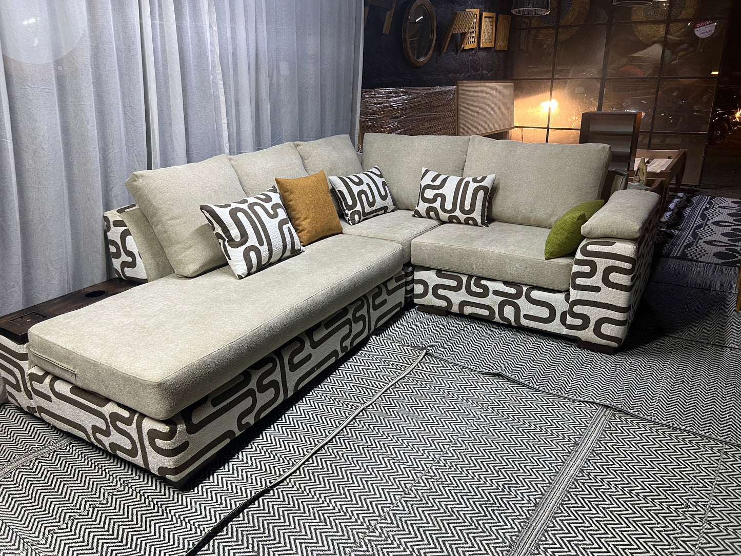 Cream and casa L-shape sofa for ksh 160,000 with 50 D cushions