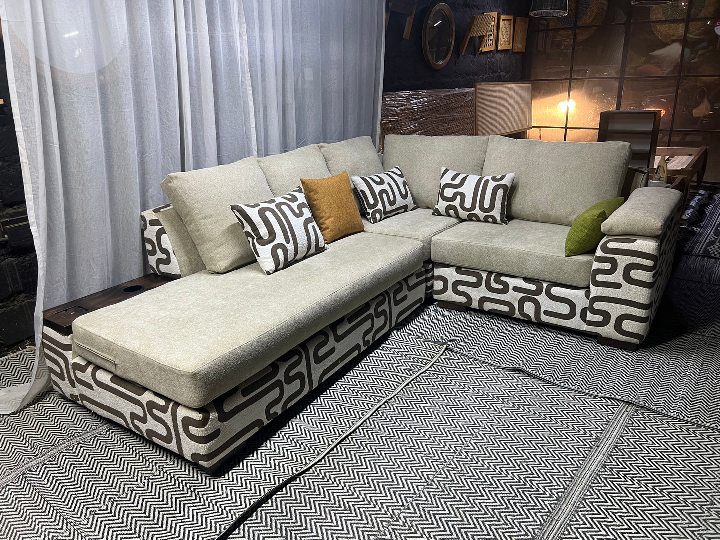 Cream and casa L-shape sofa for ksh 160,000 with 50 D cushions
