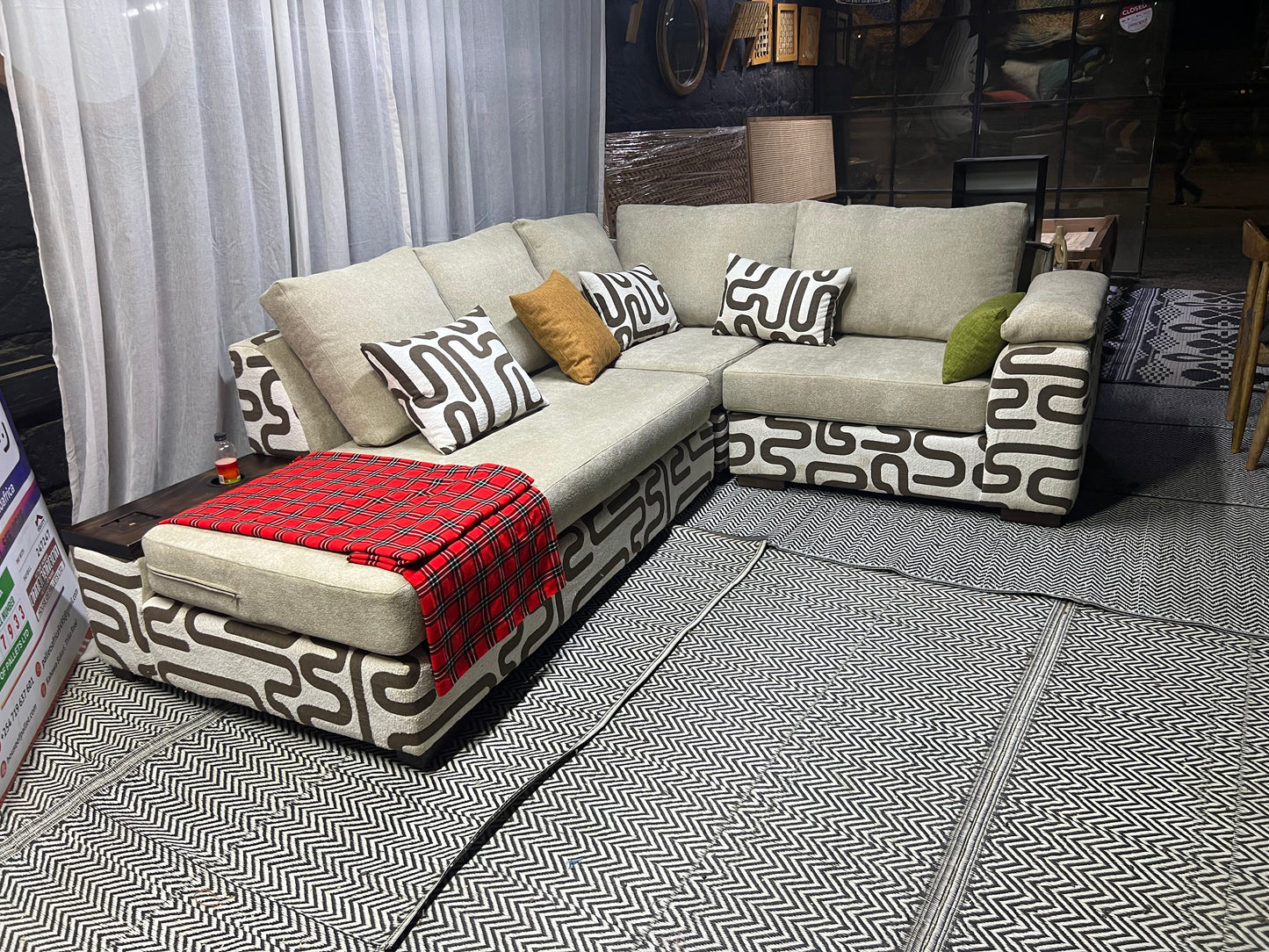 Cream and casa L-shape sofa for ksh 160,000 with 50 D cushions