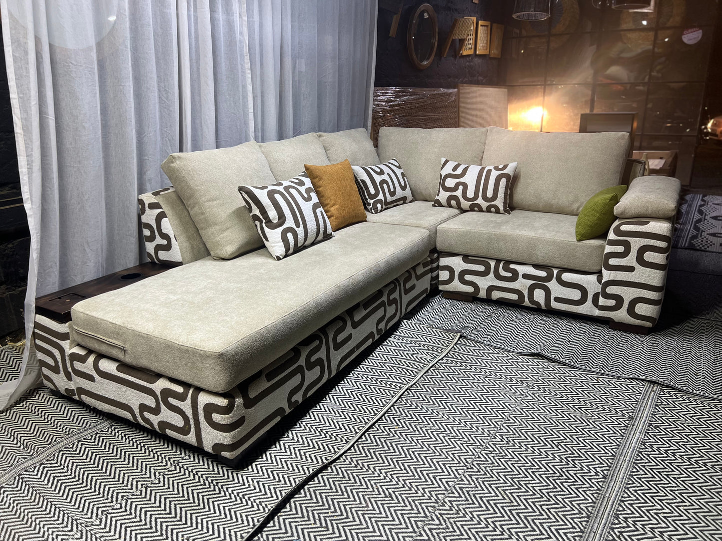 Cream and casa L-shape sofa for ksh 160,000 with 50 D cushions