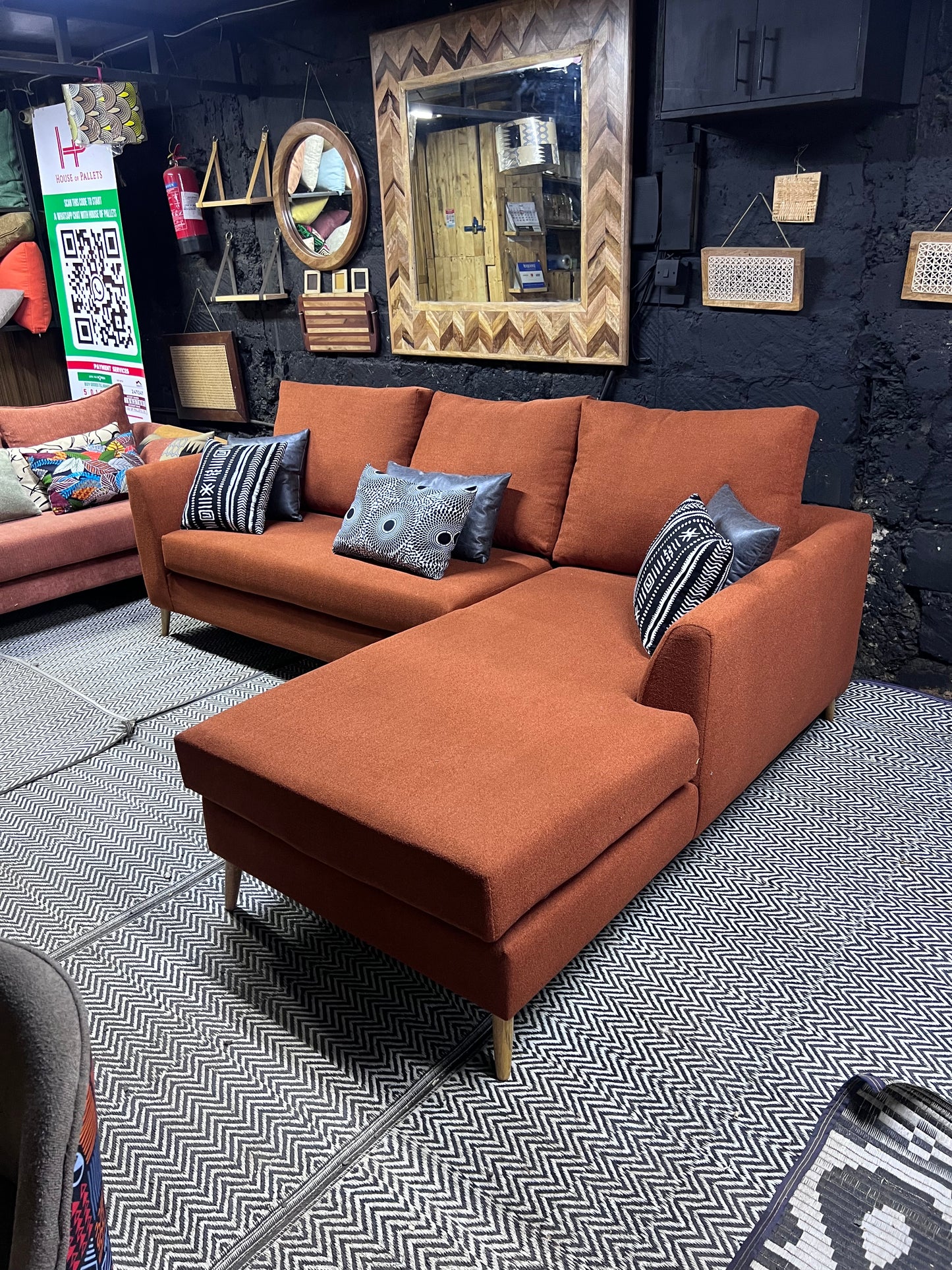 Burnt orange L-shape sofa for ksh 90,000 with 40D cushions