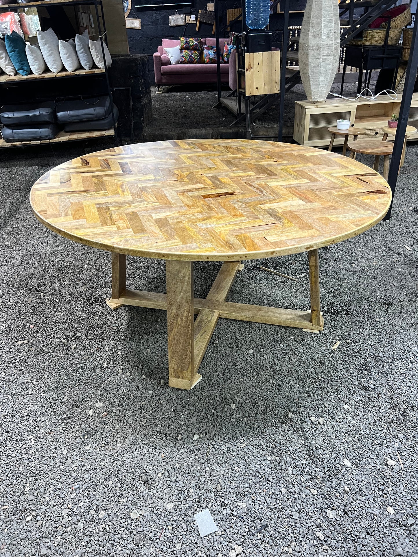 Round Mango wood herringbone pattern dining table