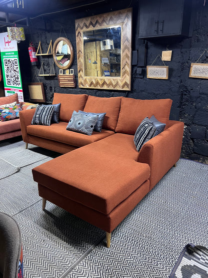 Burnt orange L-shape sofa for ksh 90,000 with 40D cushions