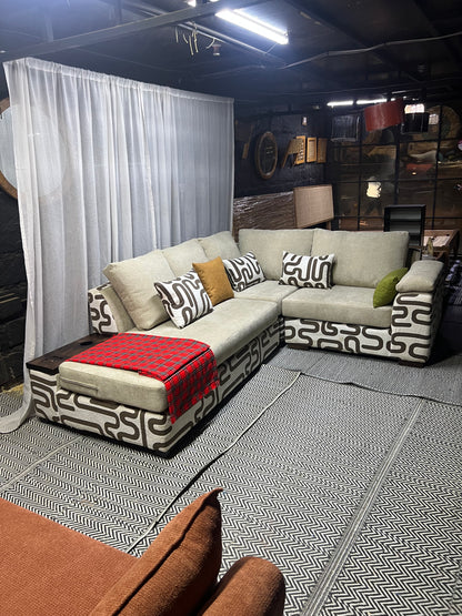 Cream and casa L-shape sofa for ksh 160,000 with 50 D cushions