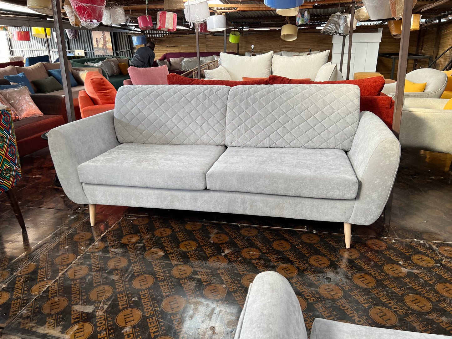 Quilted 3 seater sofa with two cushions