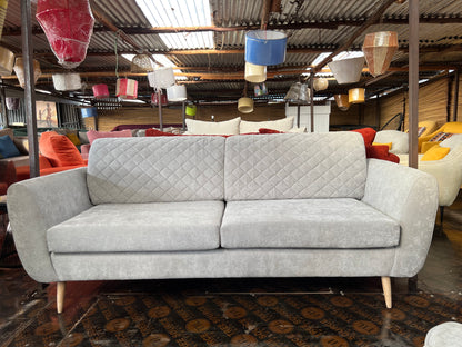 Quilted 3 seater sofa with two cushions