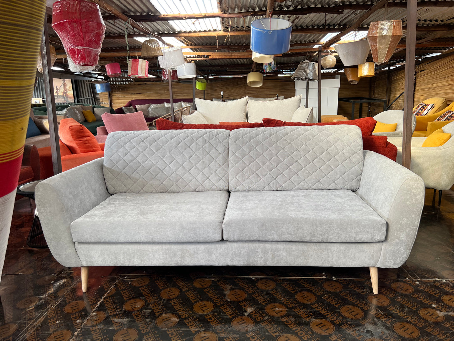 Quilted 3 seater sofa with two cushions