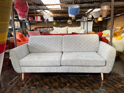 Quilted 3 seater sofa with two cushions