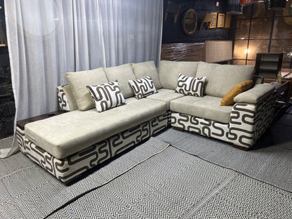 Cream and casa L-shape sofa for ksh 160,000 with 50 D cushions