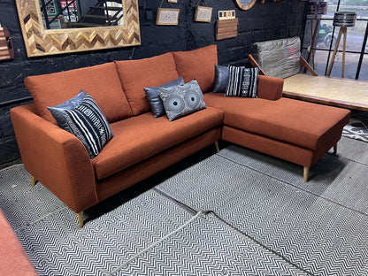 Burnt orange L-shape sofa for ksh 90,000 with 40D cushions