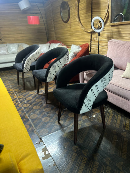 Mudcloth dining chairs with black molfino fabric for ksh 24,000 each