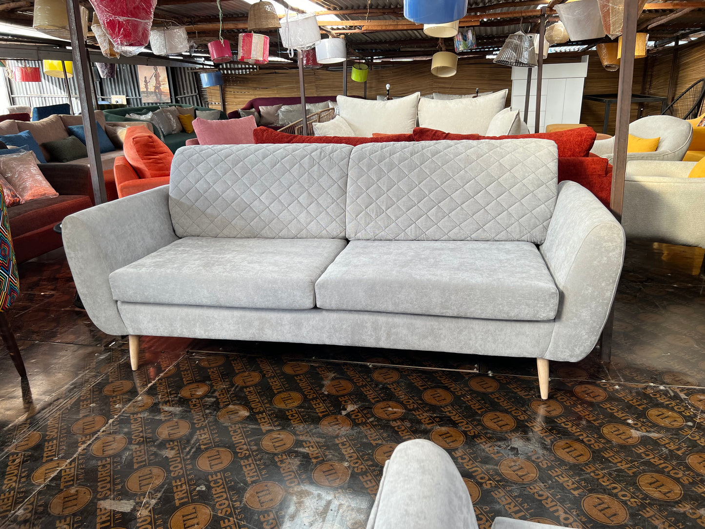 Quilted 3 seater sofa with two cushions