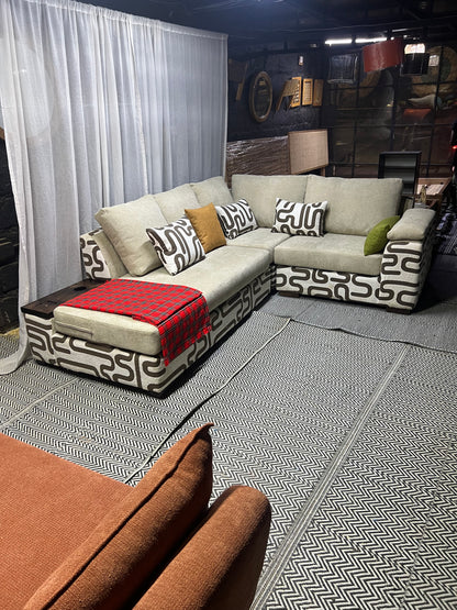 Cream and casa L-shape sofa for ksh 160,000 with 50 D cushions