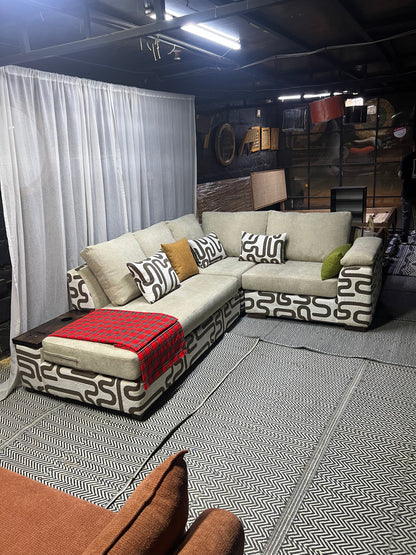 Cream and casa L-shape sofa for ksh 160,000 with 50 D cushions