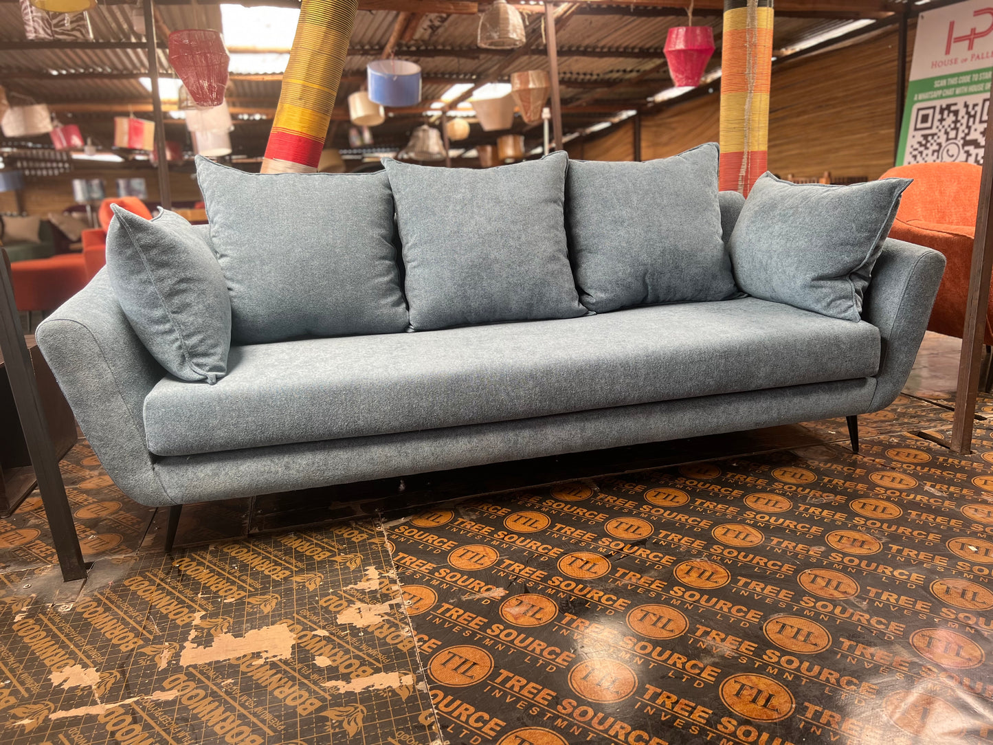 Blue 3 seater sofa available for ksh 55,000.