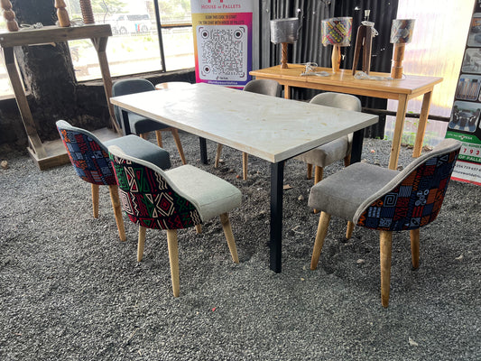 Dining set made of pine wood and kitenge fabric chairs