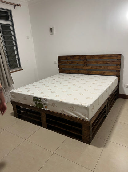 Dark oak stained pallet bed