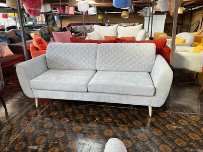 Quilted 3 seater sofa with two cushions