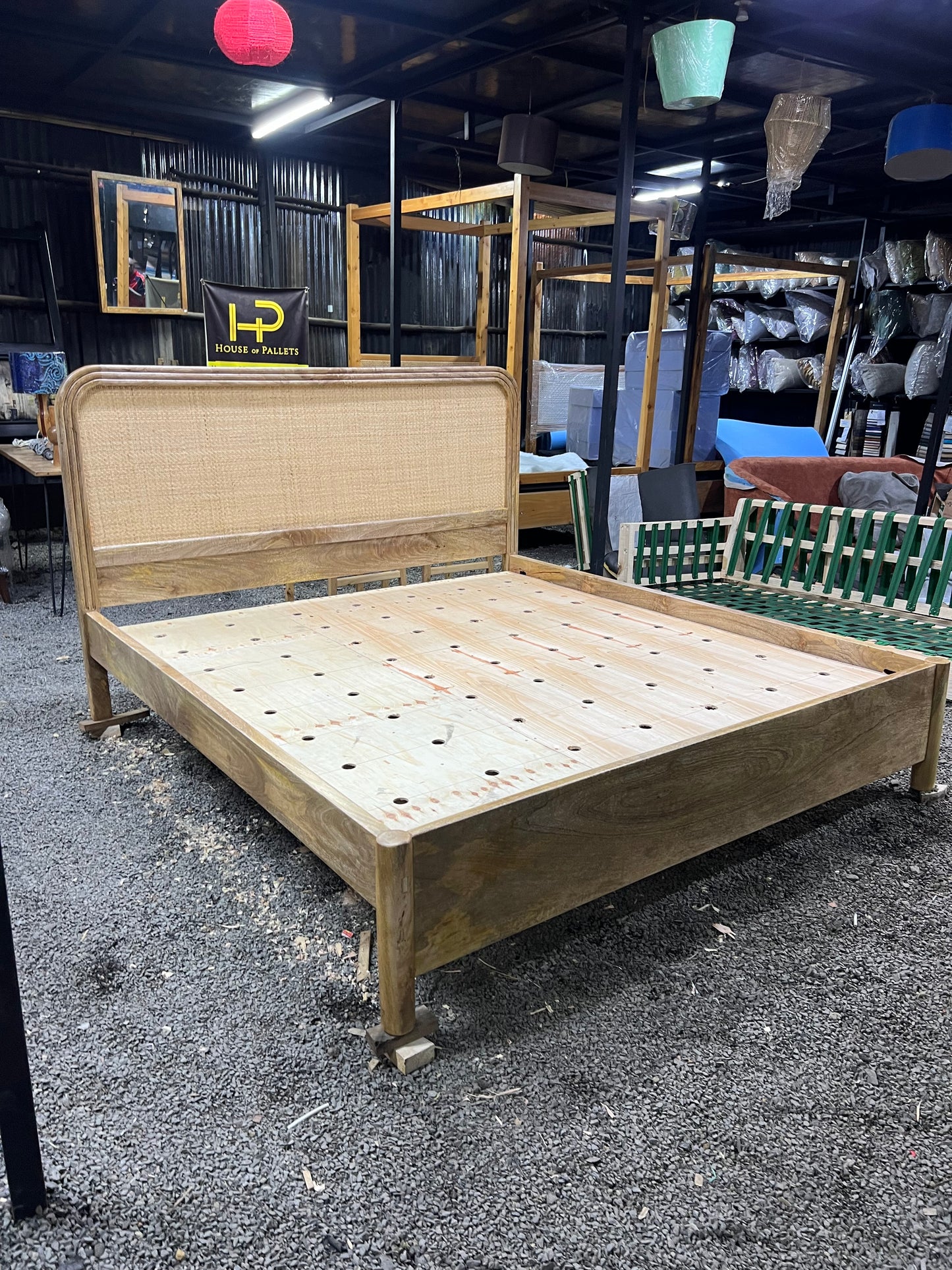 Mango wood rattan bed with curved headboard
