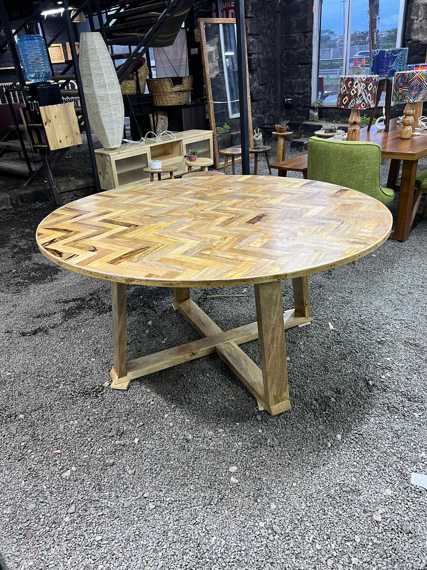 Round Mango wood herringbone pattern dining table