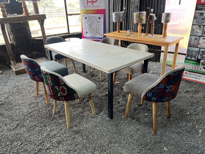 Dining set made of pine wood and kitenge fabric chairs