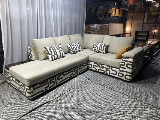 Cream and casa L-shape sofa for ksh 160,000 with 50 D cushions