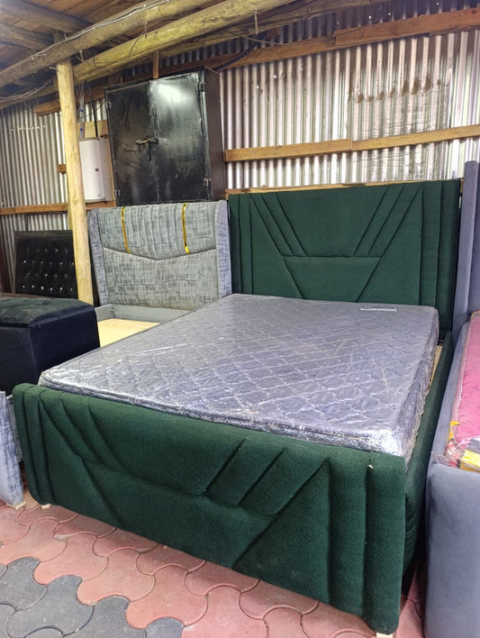 Green fabric chester bed