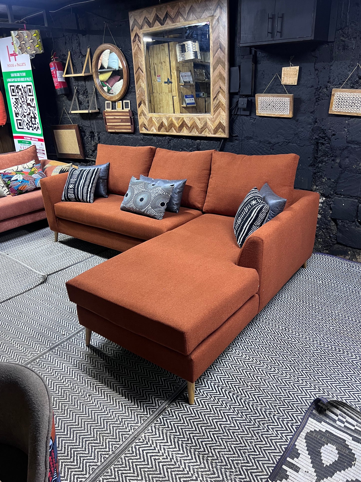 Burnt orange L-shape sofa for ksh 90,000 with 40D cushions
