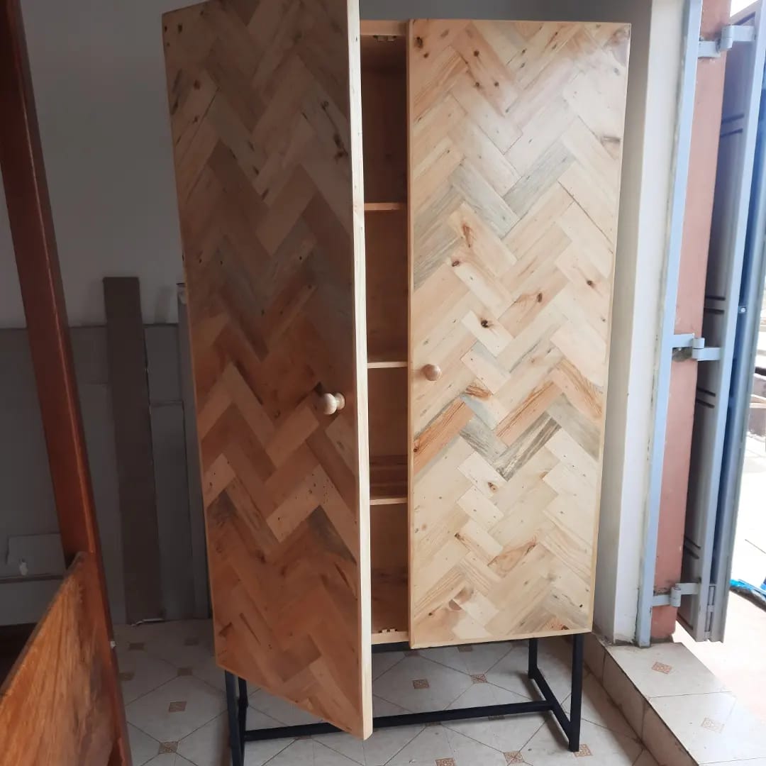 White pine storage cabinet with herringbone pattern